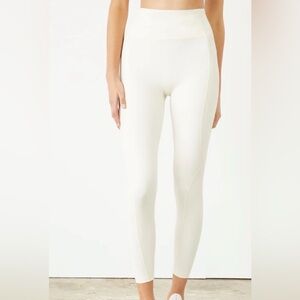NWOT Le Ore Women's Cream Leggins size L